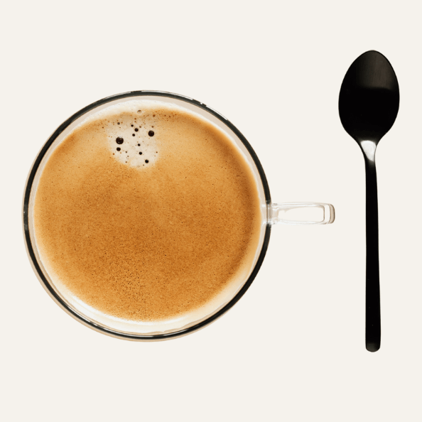 Freshly made cup of Fuelly protein coffee highlighting quality taste