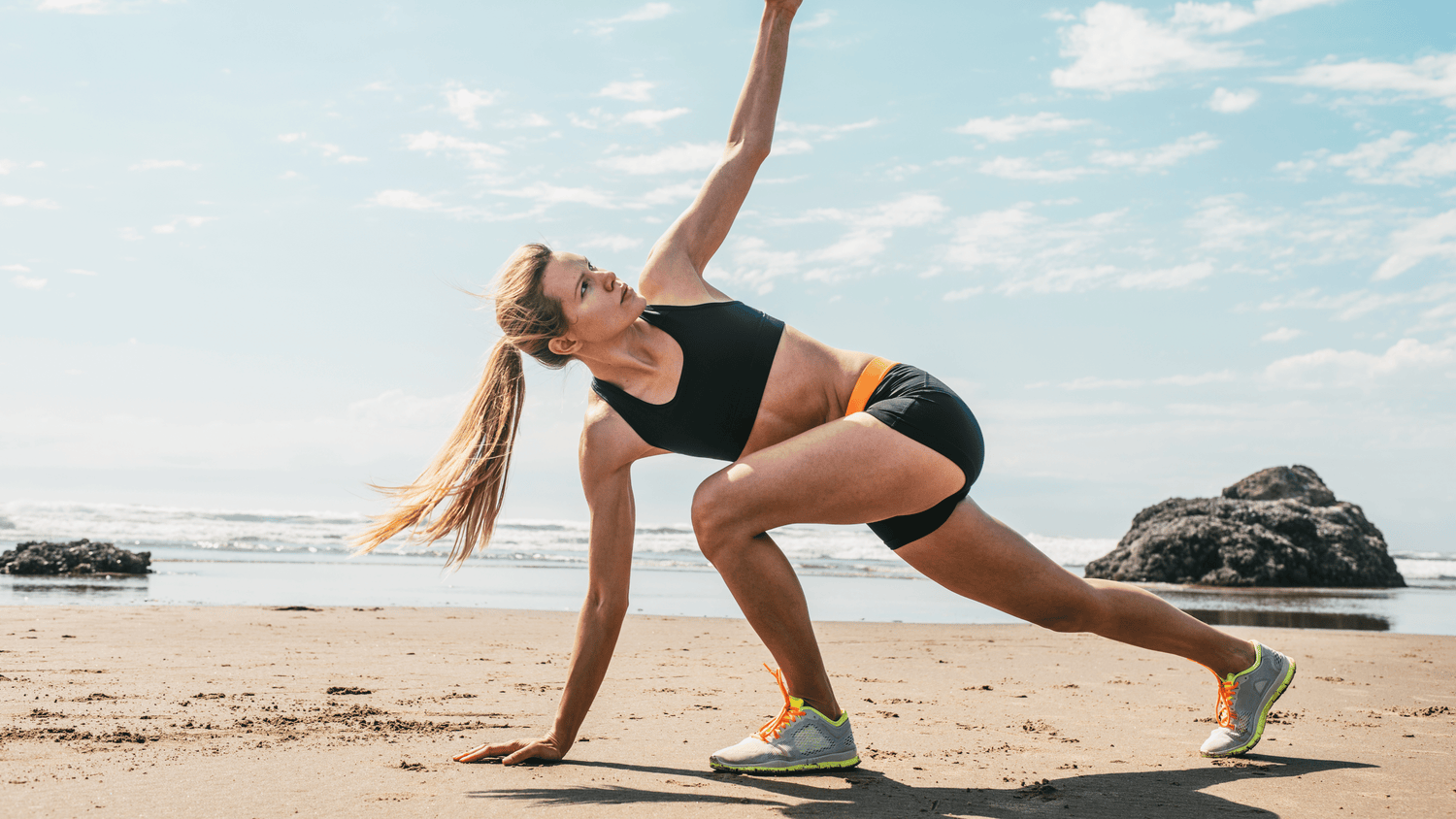 Active woman training outdoors, representing the science behind Fuelly combining protein for recovery with coffee for energy